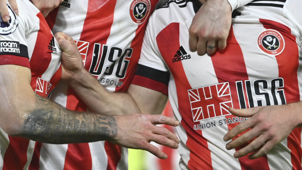 Sheffield United players celebrate the winning goal against Newcastle United in January this year. Their sponsor is now in liquidation. 