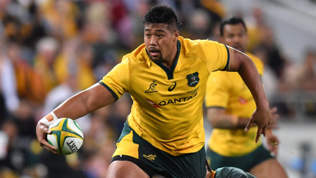Inspired by family: Folau Faingaa escapes the clutches of a Springboks defender.