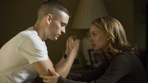 Tobey Maguire (as Sam Cahill) and Natalie Portman (as Grace Cahill) star in Brothers.