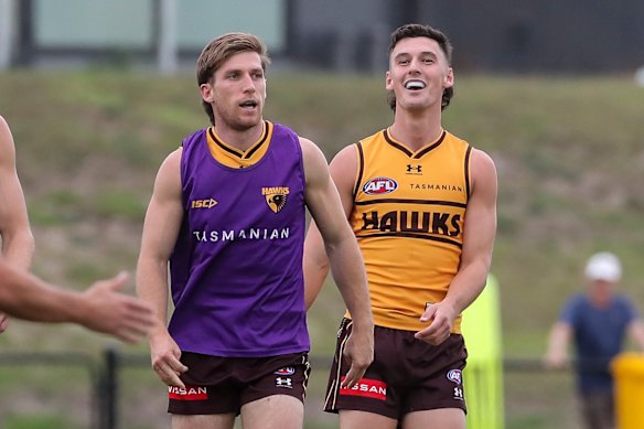 Back on track:  Moore and Macdonald at training on Wednesday. 