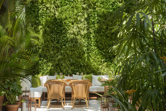 The bright and greenery swathed dining room Josh Niland’s Fysh, within Singapore Edition hotel.