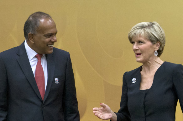 Singapore Home Affairs Minister K Shanmugam, a former foreign minister, speaks to then Australian foreign minister Julie Bishop before an ASEAN meeting in Myanmar in 2014.