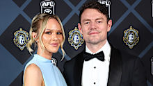 Lachie Neale and Jules Neale arrive at the 2025 Brownlow Medal on September 22, 2025 in Brisbane, Australia. 