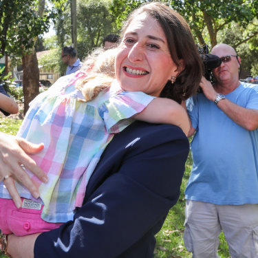 Premier Gladys Berejiklian celebrates in her electorate, Willoughby, on Sunday. 