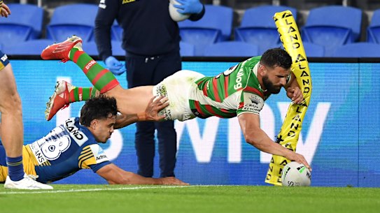 Josh Mansour scores a try.