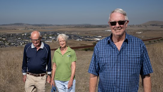 Wallan Environment Group president Norbert Ryan, and former presidents Cr Claudia James and Rob Eldridge on Green Hill, Wallan, with Herne Swamp behind them. 