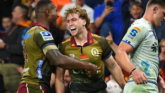 Tim Ryan scored a hat-trick on his Super Rugby starting debut for the Reds.