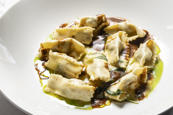 Agnolotti filled with Moreton Bay bug meat and served with a lobster bisque and butter sauce at Little Black Pig & Sons.