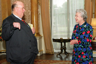 Murray meets the Queen in 1999 after winning her gold medal for poetry