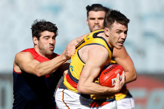 Christian Petracca tackles Paul Seedsman.