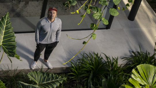 Architect Thomas Martin with a home he designed for a client in Clareville which has a green roof, lush gardens and window boxes. It is inspired by Brazilian modernism, a style of architecture that incorporate a lot of natural elements.