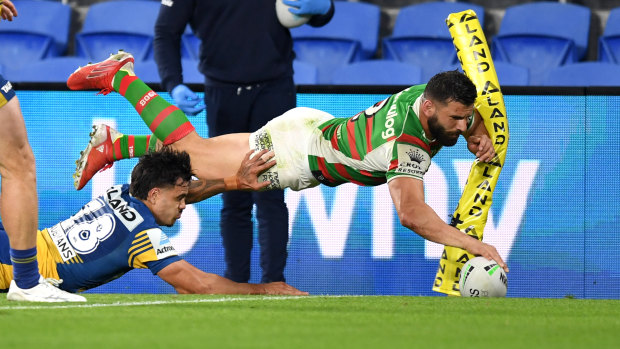 Josh Mansour scores a try early in Souths’ win over Parramatta.