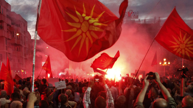 Opponents of the deal between Greece and Macedonia to change the country's name to "North Macedonia" outside the parliament in Skopje, Macedonia, in June.