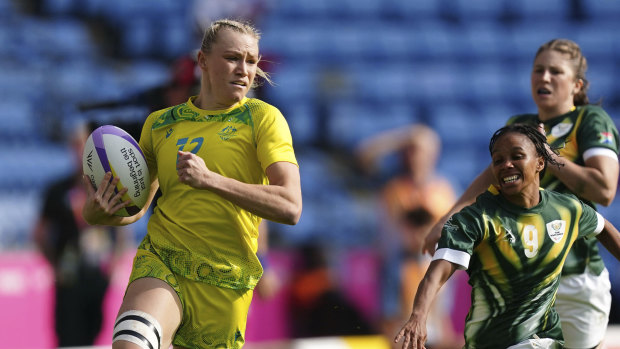 World Rugby Sevens - Charlotte Caslick shone for Australia on day one,  scoring four tries and helping her side to a quarter final spot.