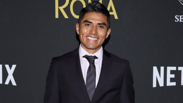 Jorge Antonio Guerrero Martinez poses for photos during the premiere of Roma in Mexico City. 
