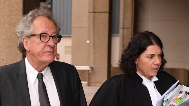 Geoffrey Rush and barrister Sue Chrysanthou arrive at the Federal Court on Wednesday.