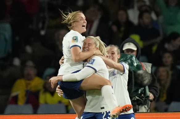 England’s Alessia Russo, center, celebrates after scoring her side’s 2nd goal