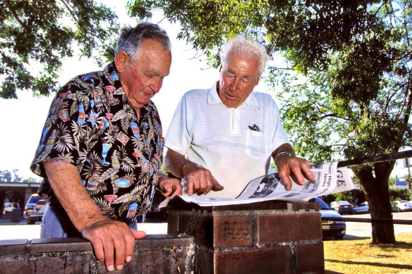 Every Thursday for almost 20 years, Albert Lyon (right) would buy The Bridge and read it to his good friend, Lenny Logan, beneath the shade of a wattle tree. 