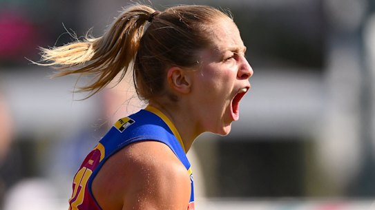 Bella Dawes of the Lions celebrates a goal during the round five AFLW match between Hawthorn Hawks and Brisbane Lions at Kinetic Stadium, on October 01, 2023, in Melbourne, Australia.
