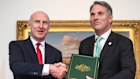 Defence Minister Richard Marles and UK counterpart John Healey sign the 50-year bilateral AUKUS treaty in Geelong on Sunday.
