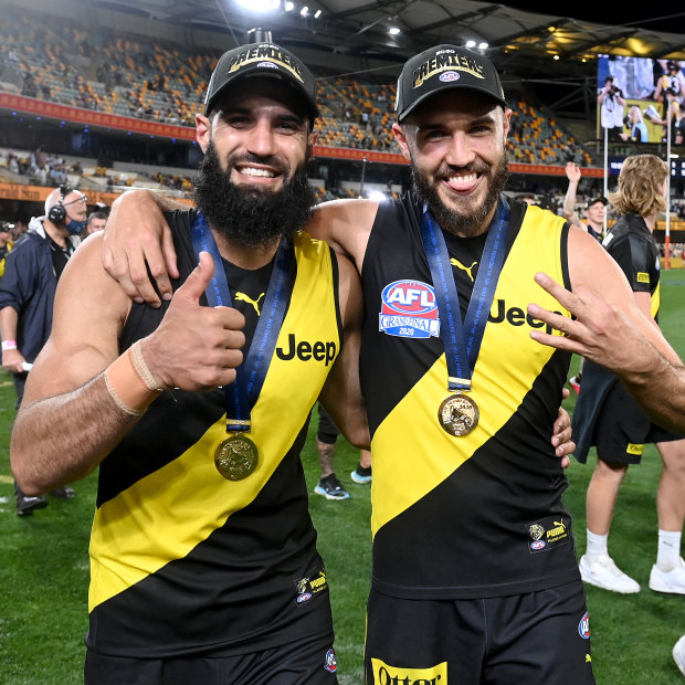 Bachar Houli and Shane Edwards celebrate victory after the 2020 AFL grand final.