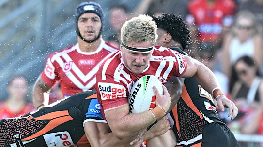 Max Plath of the Dolphins takes a run.