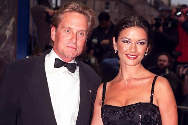 Catherine Zeta Jones, and Michael Douglas  attend The Premiere of, Entrapment, in Edinburgh,, on June 30, 1999  in, Edinburgh, Scotland.