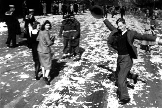 Frank McAlary stars in the iconic image of Victory in the Pacific Day celebrations on Elizabeth Street in 1945.