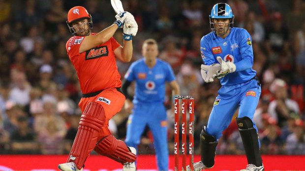 Striking out: Renegades' Aaron Finch sends one into the stands on his way to another half century.
