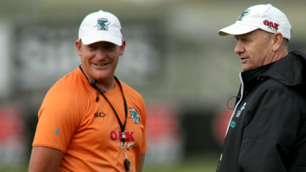Port Adelaide assistant coach Michael Voss, pictured with coach Ken Hinkley, could be eyeing a return to senior coaching.
