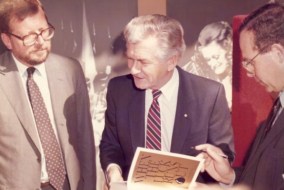 Brian Wilder (L) as Bob Hawke launches the book of Fred Hilmer on the future of the Sydney Opera House, 1985.