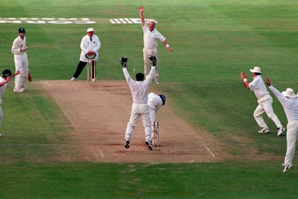 Shane Warne celebrates bowling Nasser Hussain, during the second day of the fifth Test at Trent Bridge, Nottingham