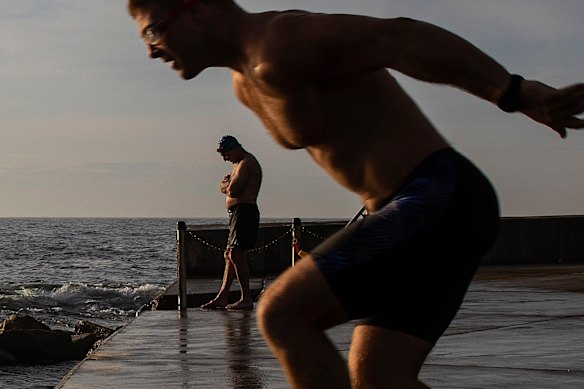 Swimmers at Clovelly getting an early start on what was forecast to be a record hot October day.