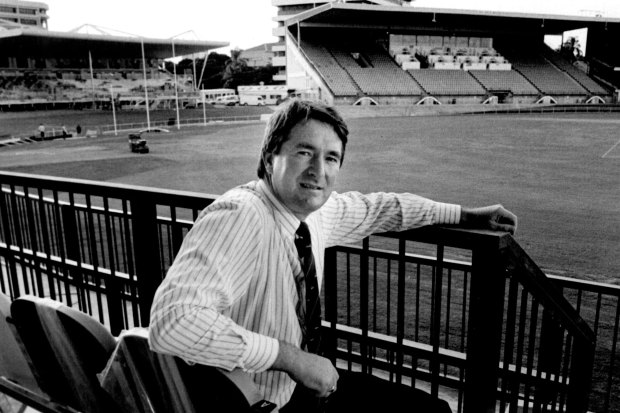 Then-Brisbane Bears CEO Andrew Ireland, with the old western stand to the left, pictured at the Gabba in 1993.