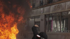 Protesters clash with riot police during May Day demonstrations in Paris, France. 
