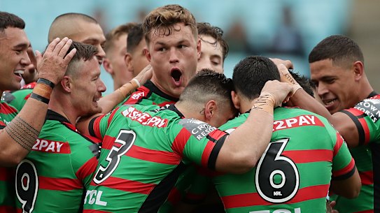Rabbitohs players celebrate a try in their round-one match against the Sharks ... When will they get to do it again?