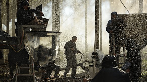 Travis Fimmel in action as Major Harry Smith on the set of Danger Close.