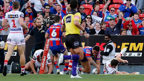 Early running: Ken Sio crosses out wide for the Knights.