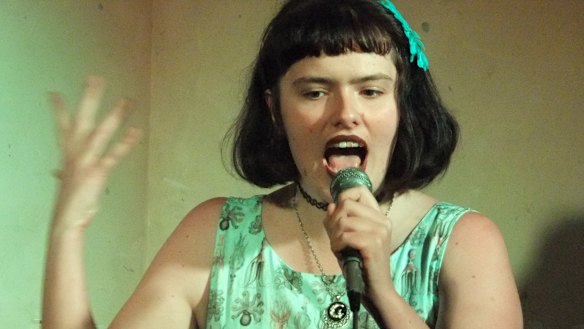 Eurydice Dixon performing stand up.