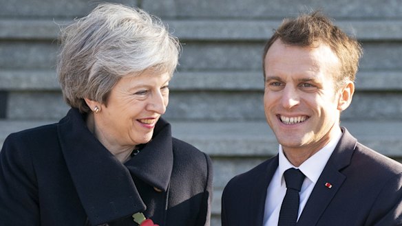 British PM Theresa May with French president Emmanuel Macron at an Armistice Day commemorations in Paris.