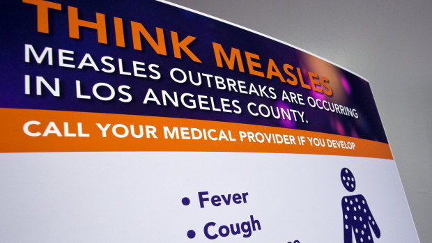 A poster released by Los Angeles County Department of Public Health is seen as experts answer questions regarding the measles response and the quarantine orders in Los Angeles.