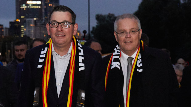 Daniel Andrews and Scott Morrison - during the annual Long Walk celebrations before the Dreamtime at the 'G clash - are the new "odd couple" of Australian politics.