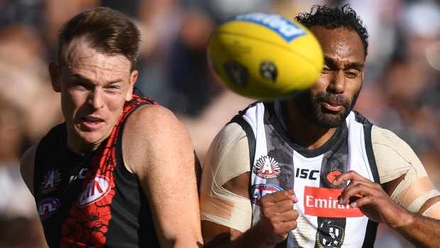 Brendon Goddard and Travis Varcoe contest the ball.