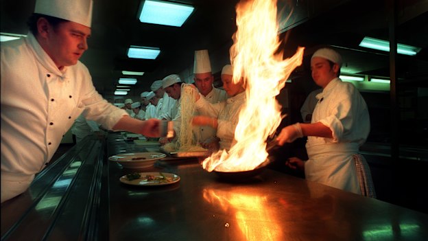 The Age caught apprentice chef George Calombaris learning how to flambe salmon at the Sofitel in 1997.