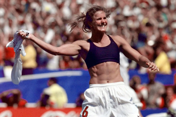 Brandi Chastain celebrates after scoring the winning penalty in their shootout against China in the 1999 Women’s World Cup final.