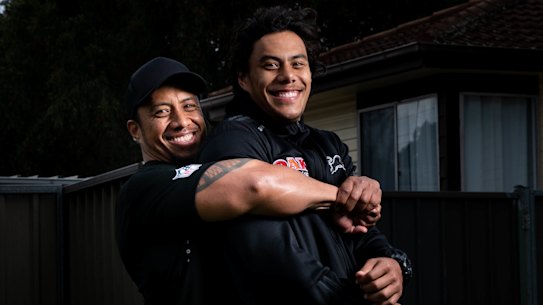 Martin Luai, who was released from prison in April, with his son Jarome at the front of their Dharruk home.