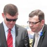The state opposition says Daniel Andrews, pictured here with Crown’s largest shareholder James Packer in 2012, is sweeping the Bergin inquiry findings “under a rug”.  