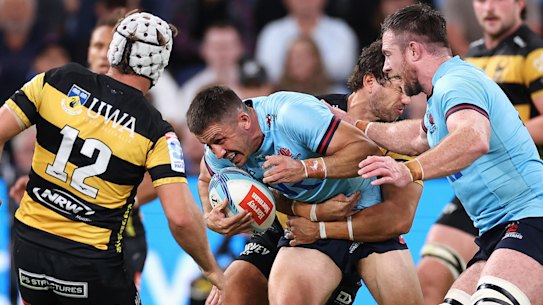 Jake Gordon is tackled by the Force.