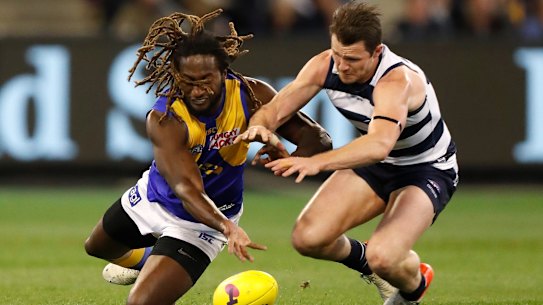 Nic Naitanui and Patrick Dangerfield vie for the ball during Friday night's semi-final.