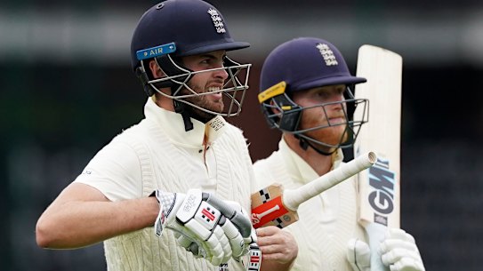 England's Dom Sibley, left, and Ben Stokes shared an unbeaten century partnership on day one in Manchester.